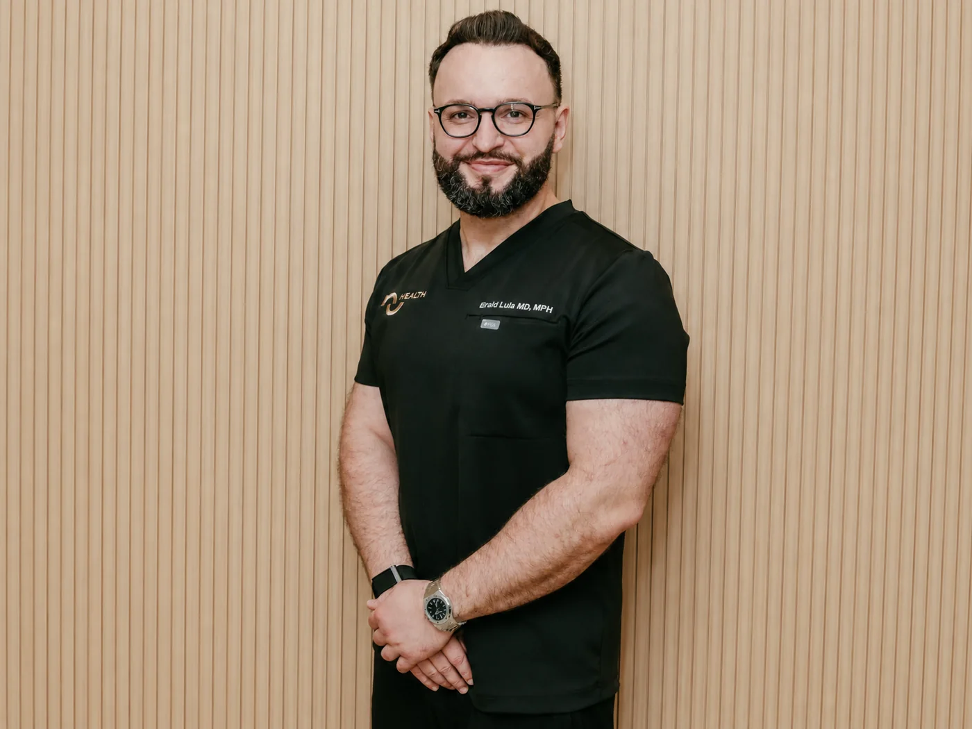 Portrait of Dr. Erald Lula, MD, MPH — NuHealth Medical Director